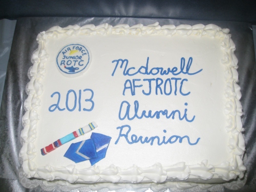 Huge cake I did last summer for our Junior ROTC Reunion.  Half vanilla/half chocolate cake, filled and frosted in American Vanilla Buttercream.  Adornments done in Marshmallow Fondant.